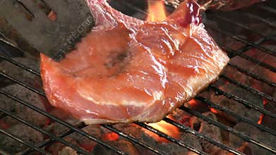 Pork chop on the grill