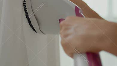 Iron delicate fabrics with a steamer for perfect results every time