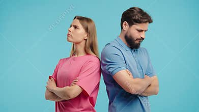 Young Offended Couple After Quarreling, Standing Back. Selfishness, Resentment