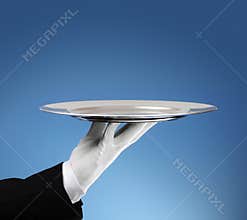 Waiter with empty silver tray