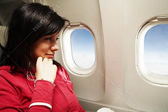 Young woman at airplane