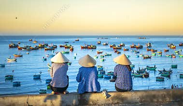 A group of vietnamese women waiting for the fishing boat