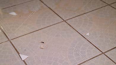 Cup of tea hitting the ground