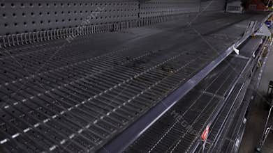 Empty shelves in the store. Food was sold out in the face of panic and crisis.