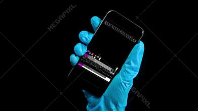Video of person wearing glove holding phonewith data