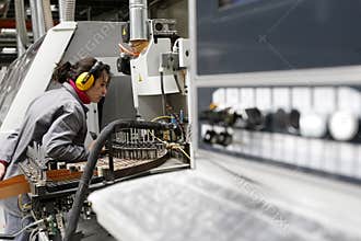 Woman working in automated factory