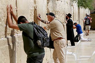 Jewish people read prayer near western wailing wall