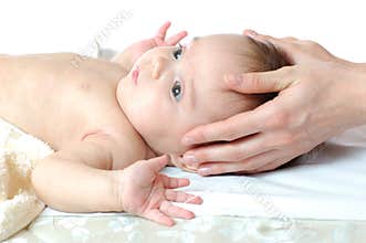 Hand massage for a four month old baby