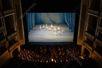 VIENNA, AUSTRIA - OCTOBER 2019: Interior of Vienna State Opera House Performance hall with visitors. Wiener Staatsoper