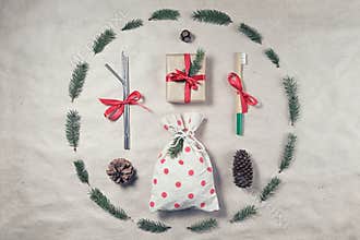 Zero waste plastic free christmas gift flatlay. Reusable metal straws, bamboo toothbrush, eco-friendly gift wrapping. Concept of