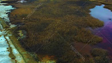 Aerial view of an open-cast mine. Toxic leaks out of Teghout tailing dam. An industrial waste disposal by copper and