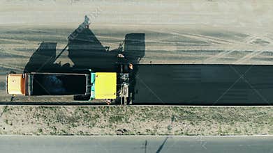 Aerial view of roadworks. Asphalt laying on a road.