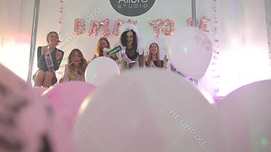 Many girlfriends girls celebrate a bachelorette party.