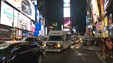 NEW YORK CITY, USA - OCT 2: Times Square Time lapse, featured with Taxi Cabs, Shops and animated LED signs, is a symbol of New