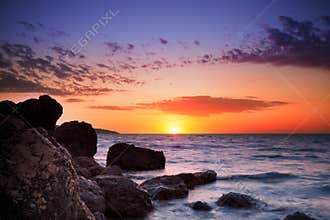 Sunrise over ocean horizon