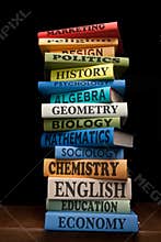 Education study books pile college textbooks