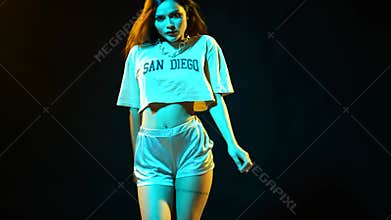 Beautiful Asian girl dancing freestyle, hip hop, dancehall, street dance style