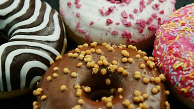 Glazed sweet doughnuts in closeup