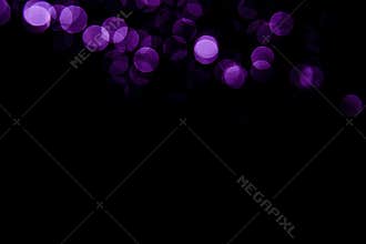 Abstract background purple bokeh with black background