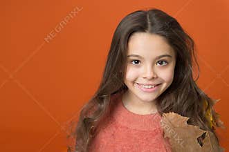 Keep skin healthy in fall. Little child wear leaves in long hair. Skincare routine for autumn. Natural skincare