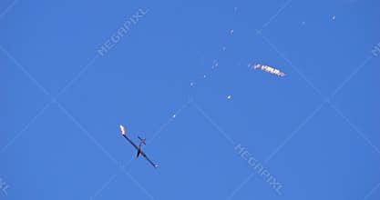 Glider Extreme Aerobatics doing Wingtip Fireworks in the Blue Sky