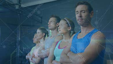 Animation of dots connecting with lines over caucasian people with arms crossed looking away in gym