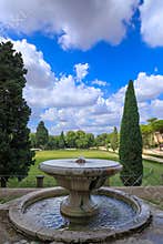 Villa borghese Garden in Rome, Italy: view of Puppet Fountain with Piazza di Siena in the background.