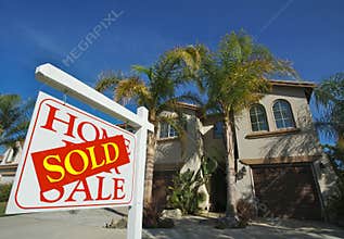 Sold Home For Sale Sign & Home