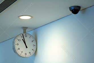 Clock and security camera