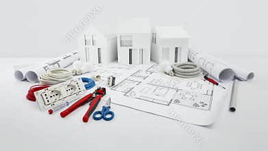 Electrical controls for house planning, equipment and electrician work tools on blueprint with model house, electric store,