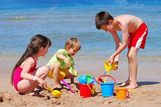 children playing at the beach