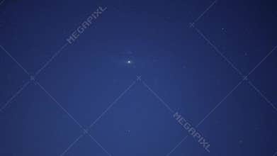 Andromeda galaxy and a night sky full of stars shining bright