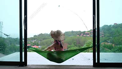 Friendly Lady Relaxing Hammock View Over Scenic Hills in Lanta Island , Krabi