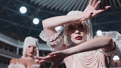 Confident Burlesque Dancers In Theater