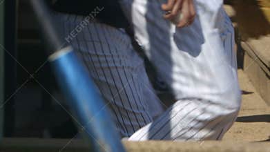 Baseball players run from dugout in slow motion