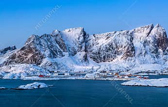 Snow-covered fjord villages