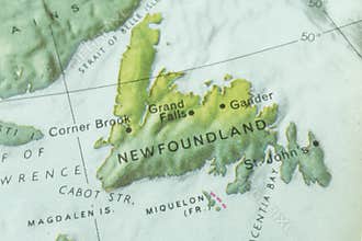 Close-up of an antique map, displaying Newfoundland and Labrador Labrador connected to mainland Canada, Newfoundland an