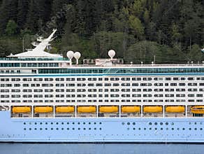 2026.06.01. Ketchikan, Alaska - Mid structure of a cruise ship, with lifeboats, guest cabins and the pool area