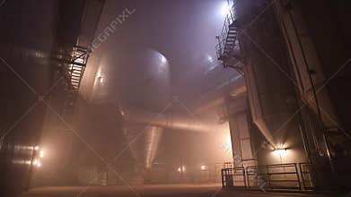 Industrial power plant interior with smoke and fog