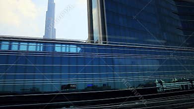 Tracking shot of modern skylines from Dubai Metro, Dubai, United Arab Emirates