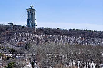 Early Spring Snow - View of the Tower at Jingyuetan National Forest Park, Changchun, China