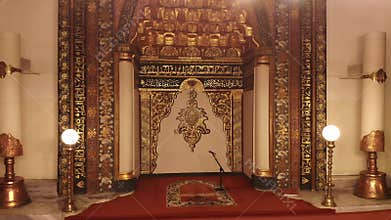 Ornate mihrab and Islamic decoration glow inside Bursa Ulu Cami at night in Turkiye, mosque, interior, ulu camii, camii