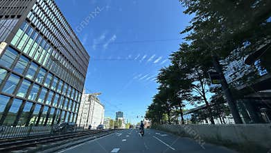Modern office district in Amsterdam Zuid with glass business buildings, broad