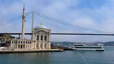 Ortakoy Mosque and Bosphorus Bridge - view from ferry in Istanbul