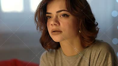 Sad Depressed Beautiful Young Woman Crying In Bedroom At Home