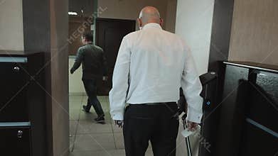 Entrance Gate Access Touch technology security system Office Building with businessmans going to work