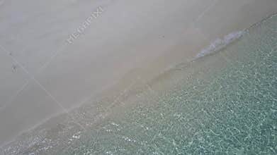 Gentle waves rolling onto a beach