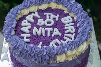 50 th birthday cake made out of purple yams