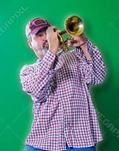 Adult male playing blues on a trumpet