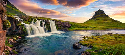 Summer sunset on famous Kirkjufellsfoss Waterfall and Kirkjufell